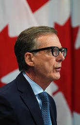 Bank of Canada Governor Tiff Macklem arrives at a press conference in Ottawa on Oct. 26, 2022.