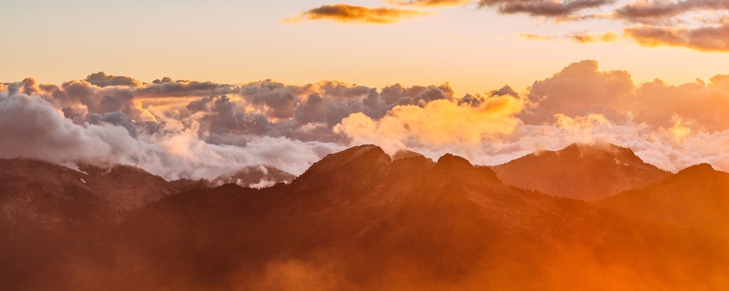 Mountains and clouds in a sunset
