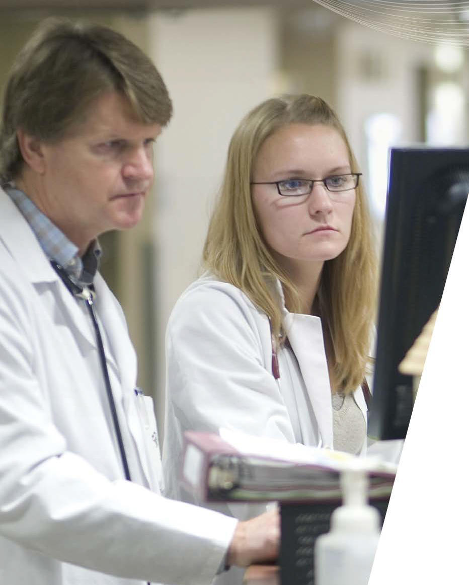 Two doctors looking at a computer