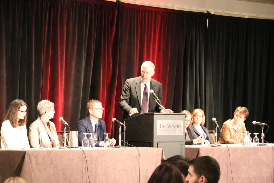William Ghali speaking on a panel