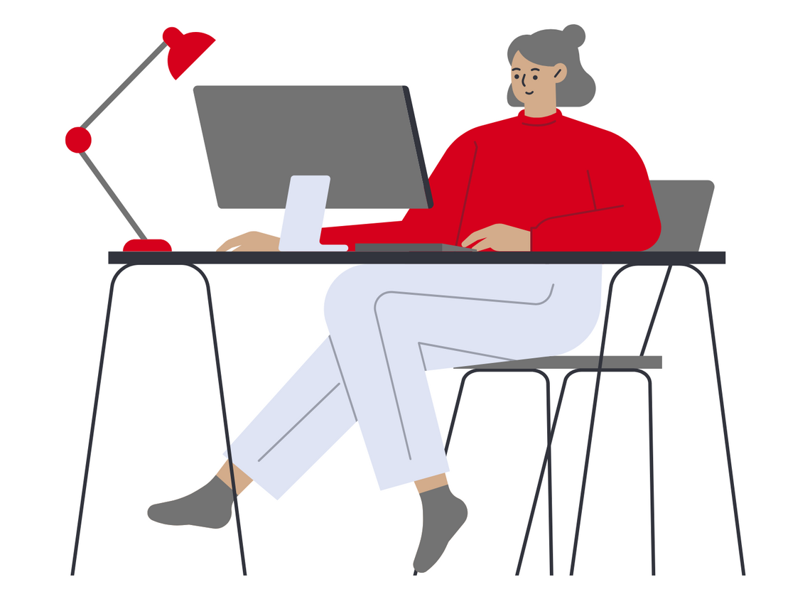 woman sitting at a computer