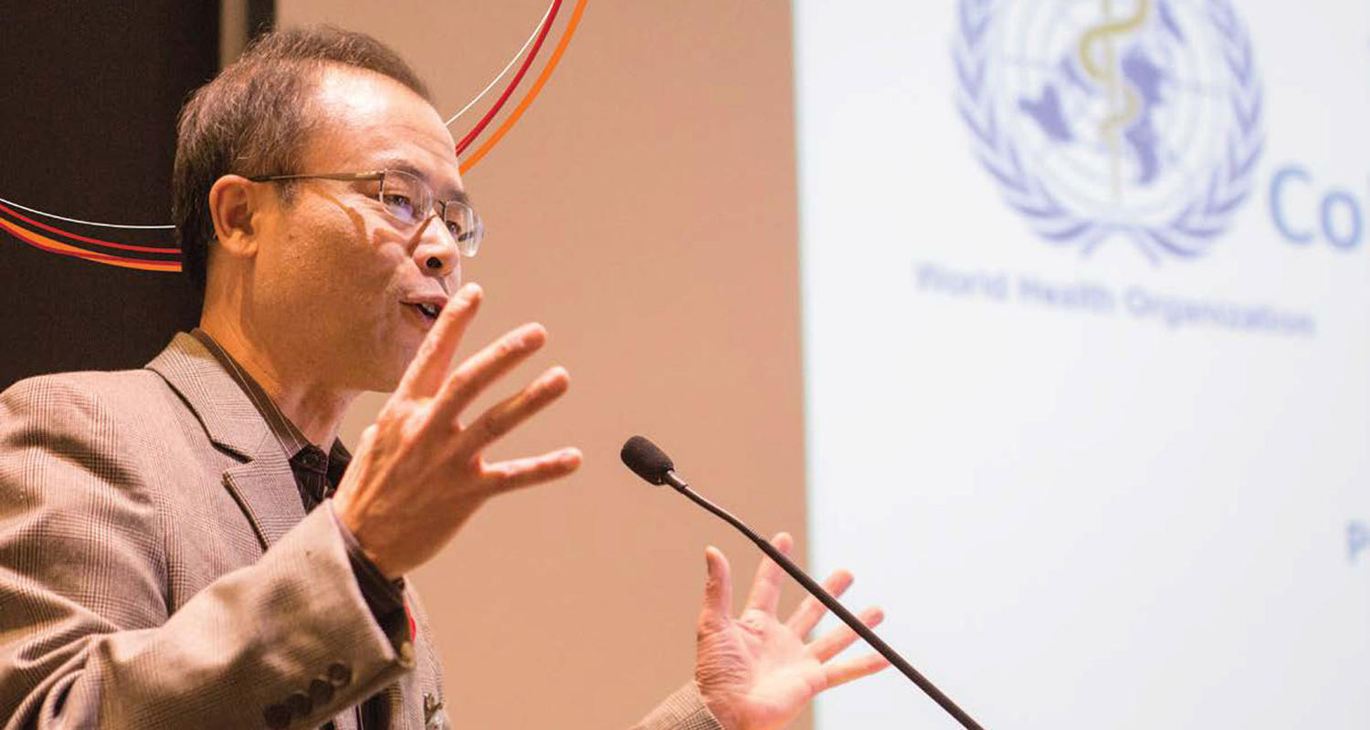 Hude Quan speaking to the World Health Organization