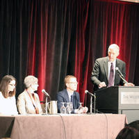 William Ghali speaks to a panel at an eHealth event 