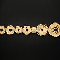 Line of gears on a black background