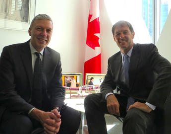 O'Brien Institute former scientific director Dr. William Ghali and Canadian ambassador to Qatar Adrian Norfolk